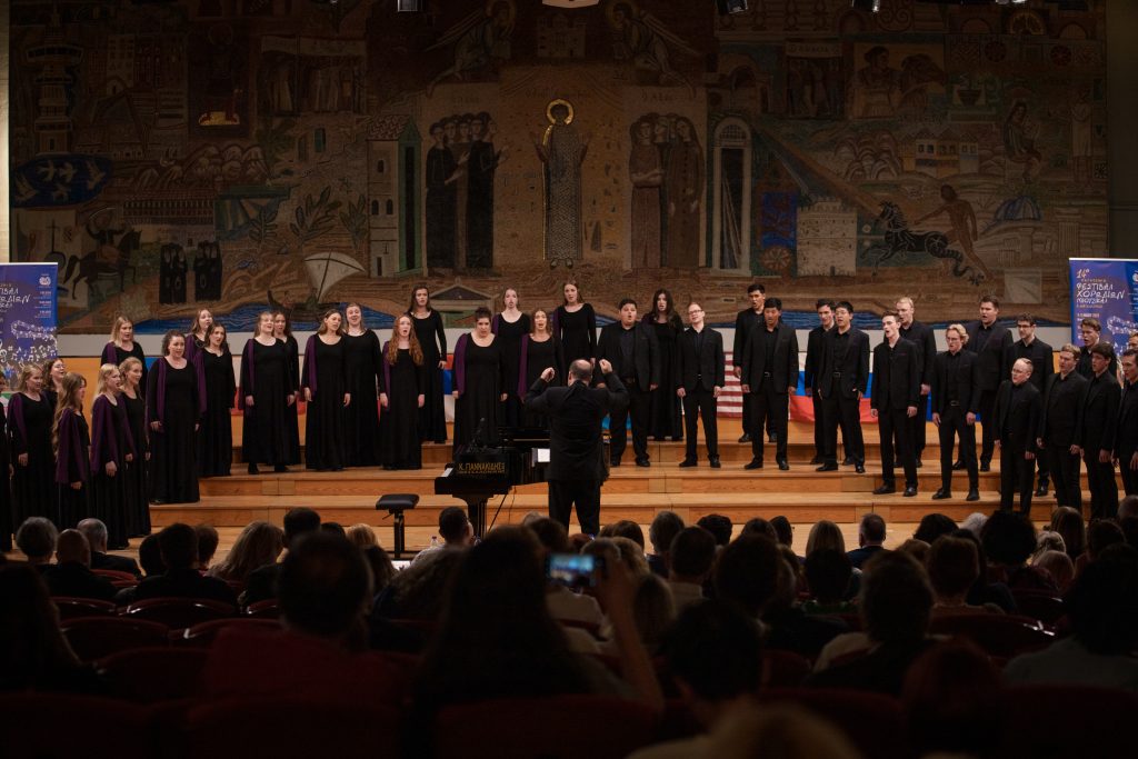 BYU Singers performing in concert under the direction of their conductor during their European tour