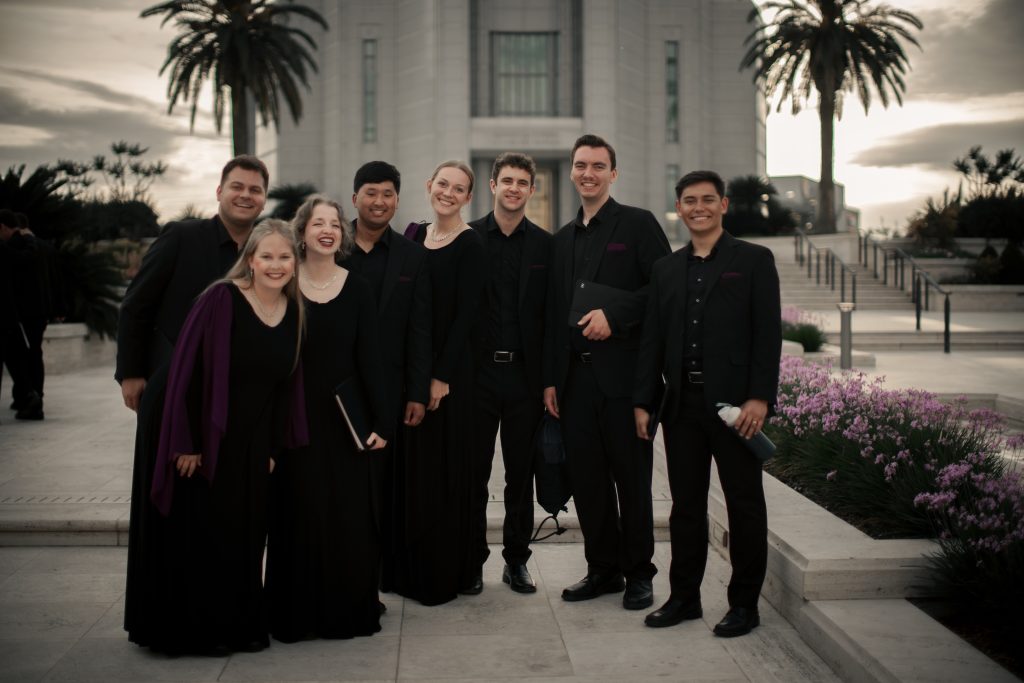 Members of BYU Singers smiling outside the Rome Italy Temple
